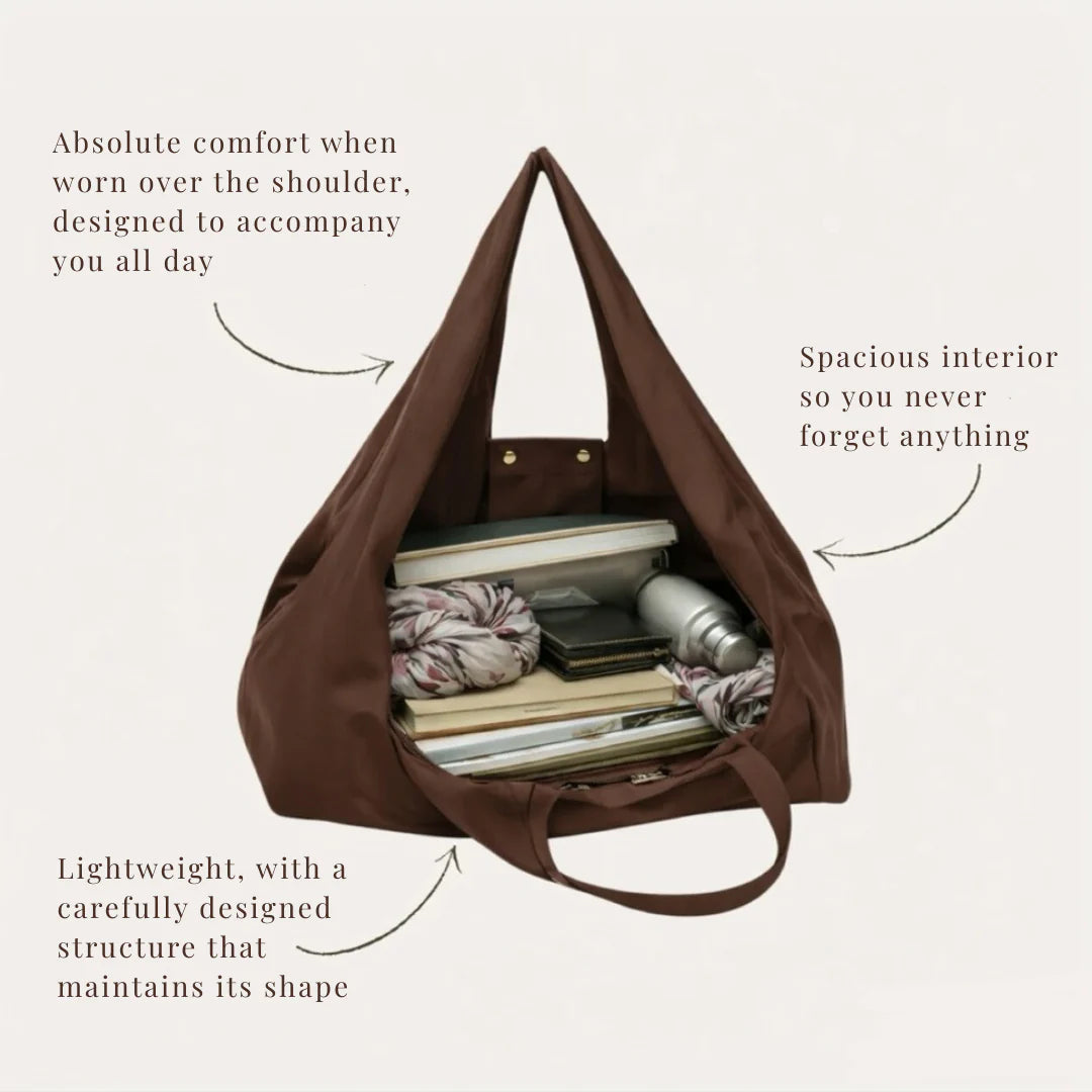 Brown shoulder bag with text highlighting its features on a light beige background