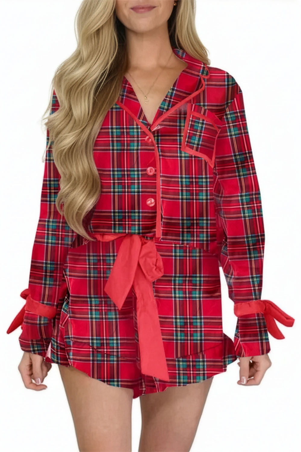 Red plaid pajama set with a tie waist on a white background