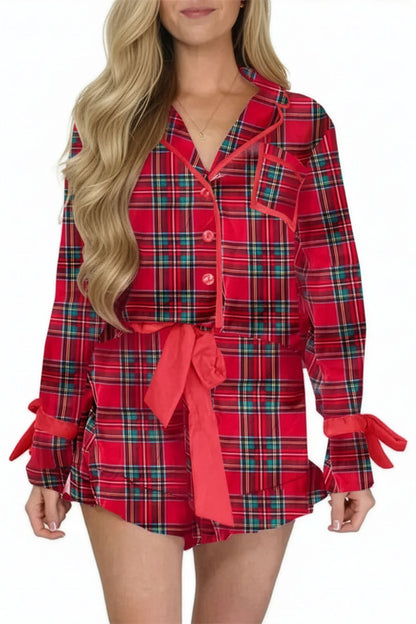 Red plaid pajama set with a tie waist on a white background