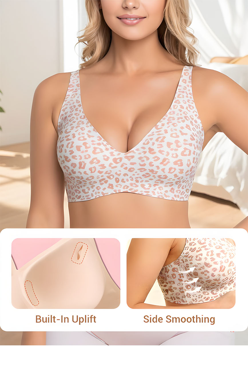 Woman wearing a patterned bra with built-in uplift and side smoothing features.