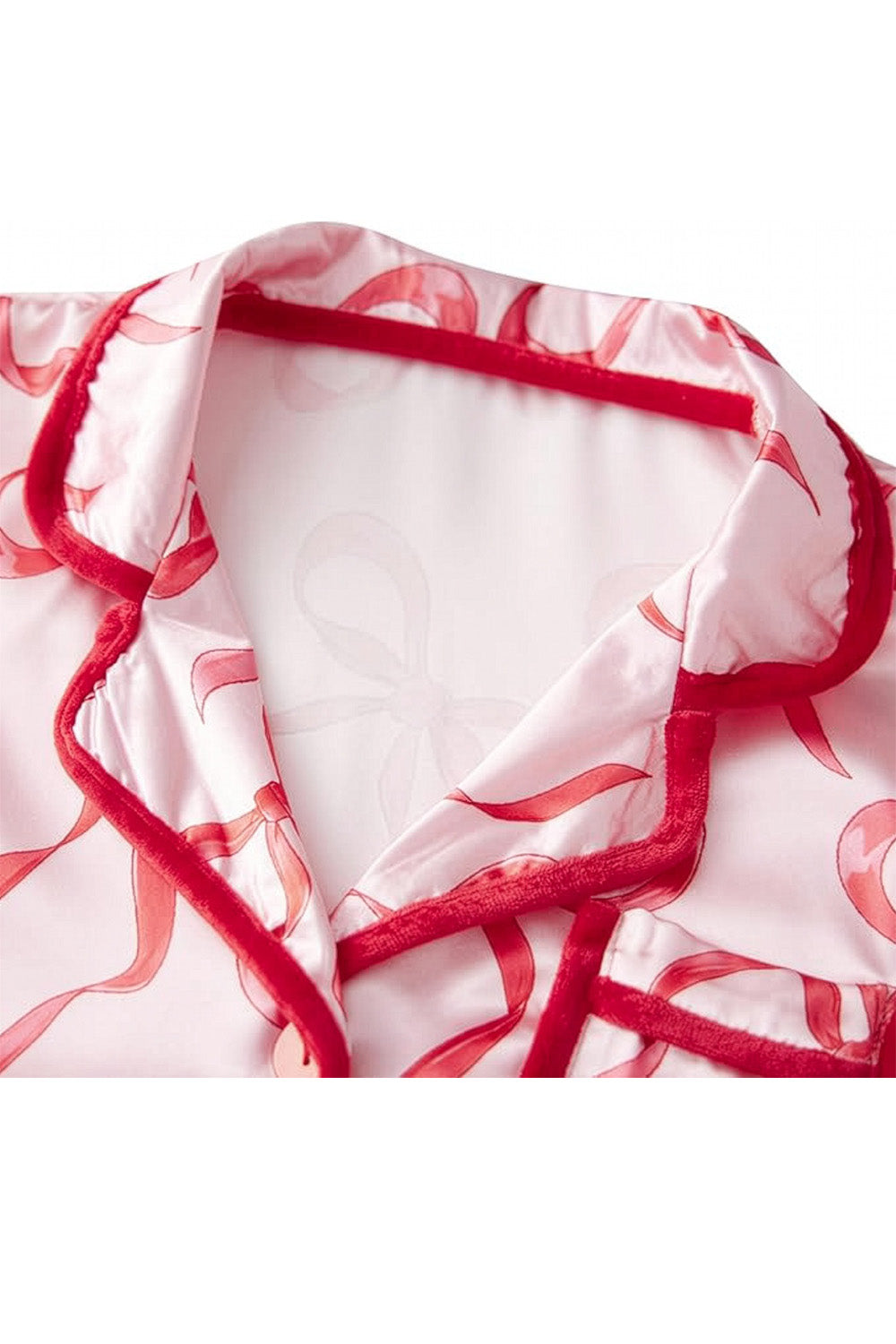 Red and white patterned fabric on a white background